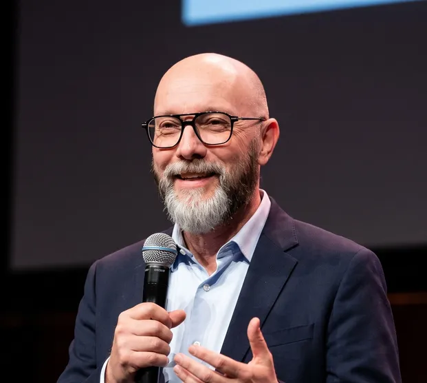 Kurt Schmidt speaking at a conference